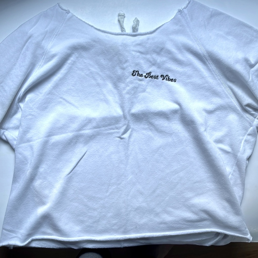 Rue21 “the best vibes” white cropped tee, tie up back. Used, in good condition